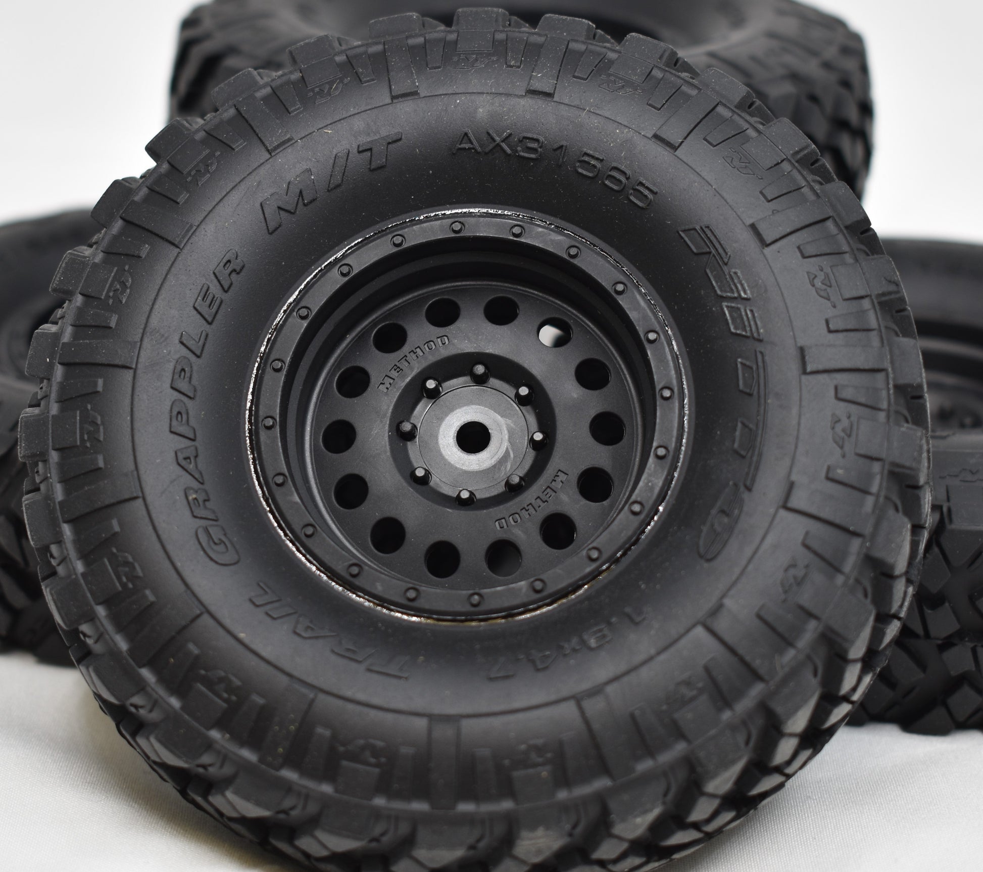 Axial SCX10 II Deadbolt Wheels and Tires with Center Caps - Dirt Cheap RC SAVING YOU MONEY, ONE PART AT A TIME